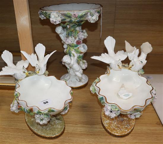 A Moore Bros. three piece garniture centrepiece (a.f.) largest 34cm